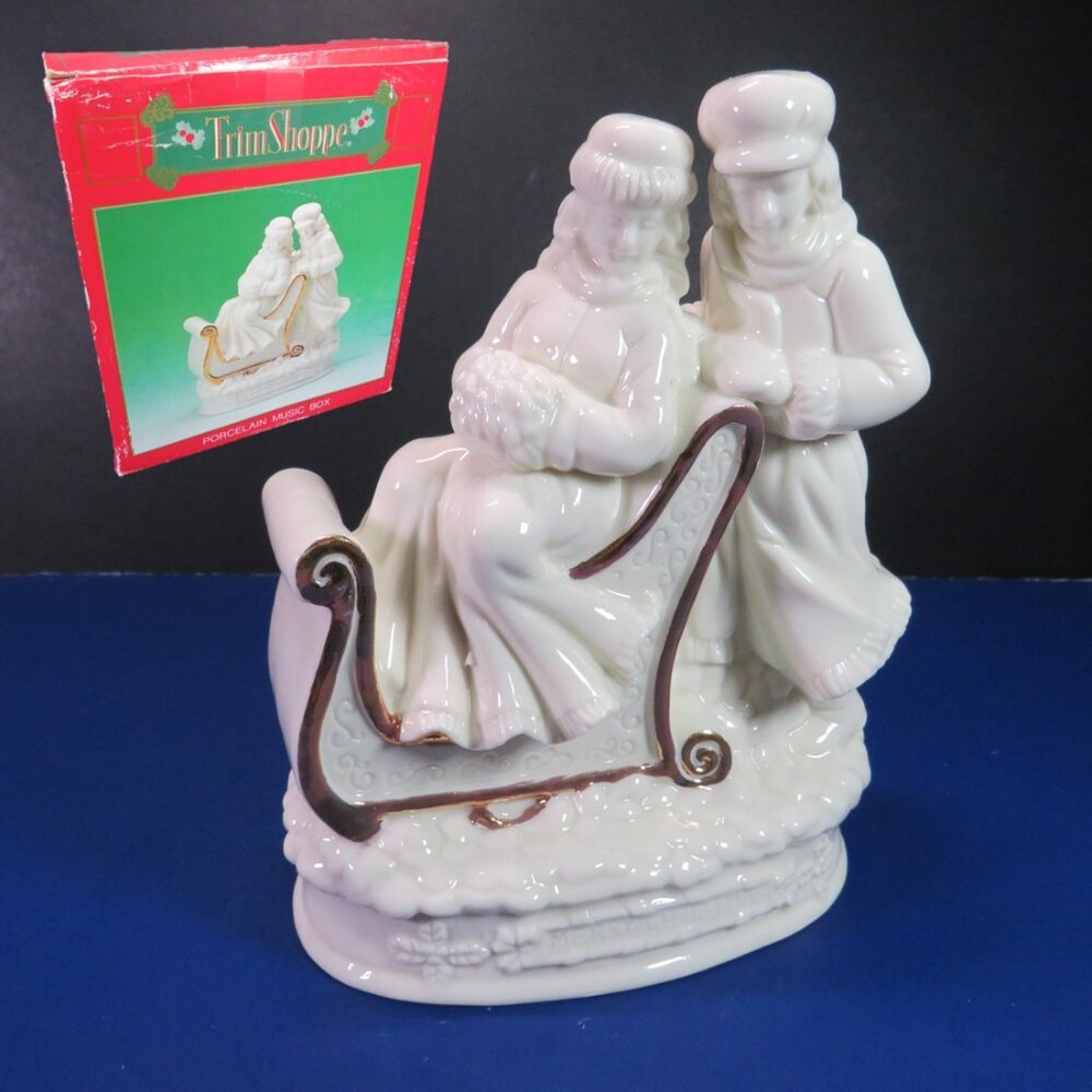 Trim Shoppe Porcelain Two People w/ Sled MUSIC BOX Holiday Christmas Figurine